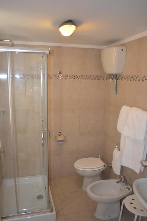 Koupelna v ubytování Hotel Paradiso