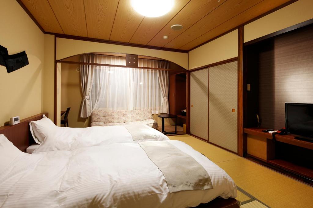 Yunokawa Onsen Emi Hakodateya - Dreifachzimmer Mit Eigenem Bad (Zwilling D)