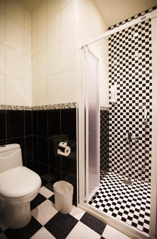 Koupelna v ubytování Kaishen Hotel