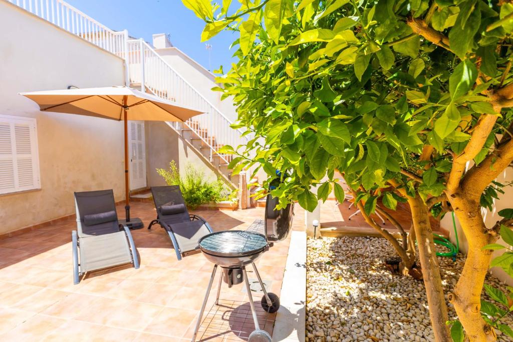 Zahrada ubytování Casa Embat, a pocos metros de la playa