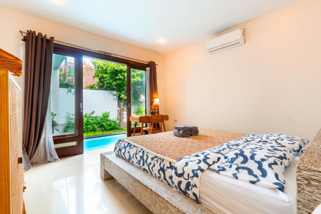 Katil atau katil-katil dalam bilik di Baliwatchi villa with Kitchen, Wi-Fi and Pool