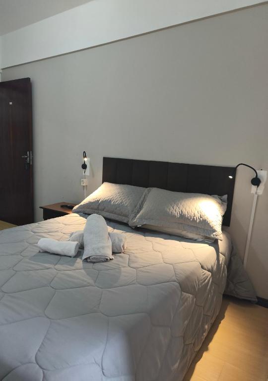 Postel nebo postele na pokoji v ubytování Hotel Colonial