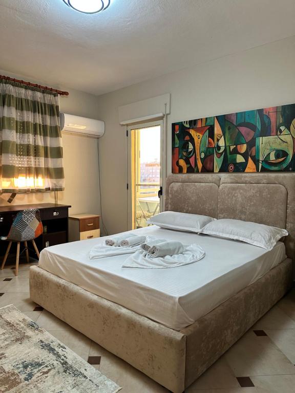 Postel nebo postele na pokoji v ubytování Coastal Haven Apartment