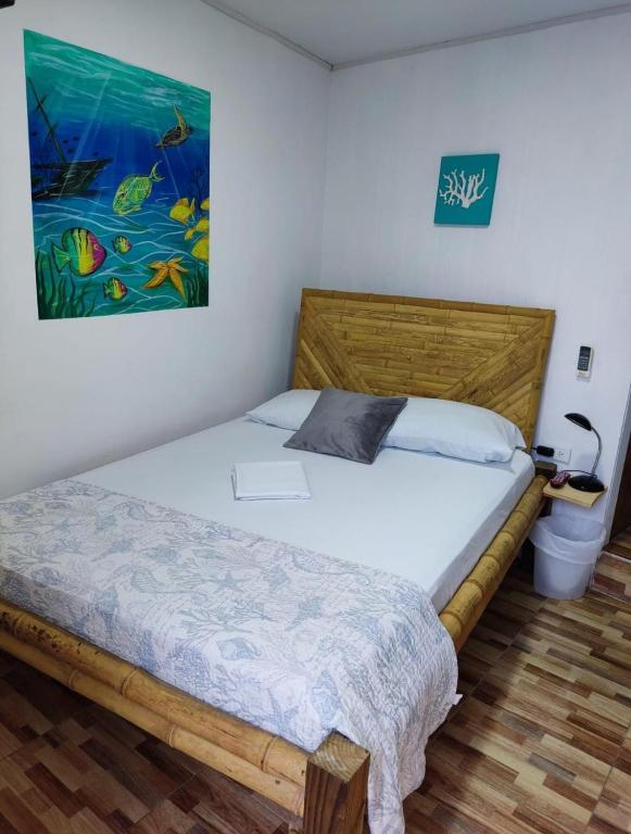 Postel nebo postele na pokoji v ubytování Posada San Nicolas