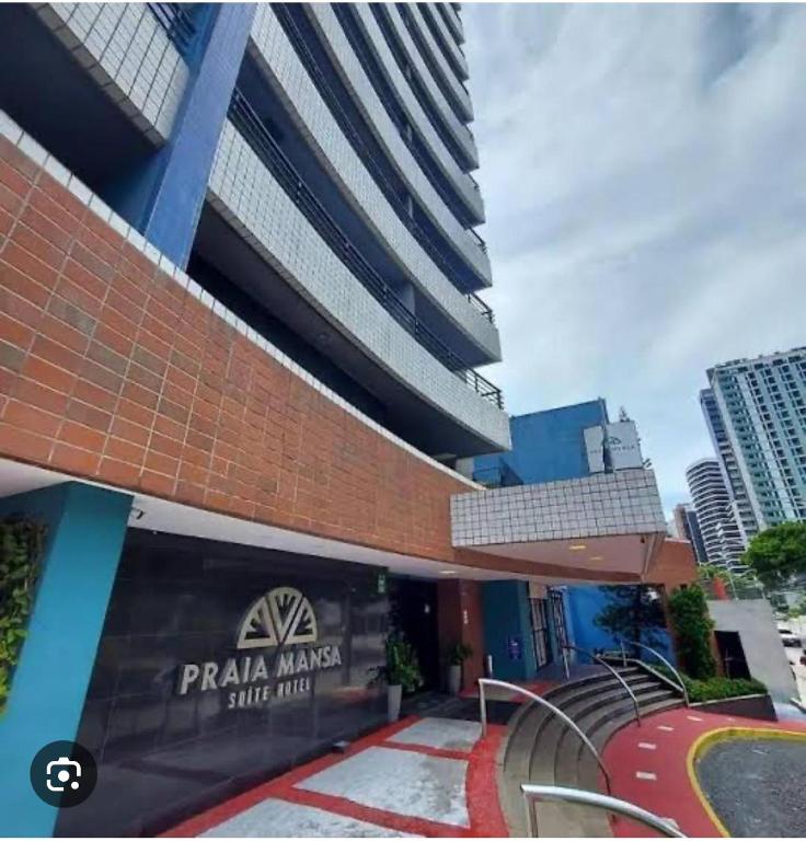a building with a sign that reads piama markets singapore at Praia Mansa Suite Hotel Flat in Fortaleza