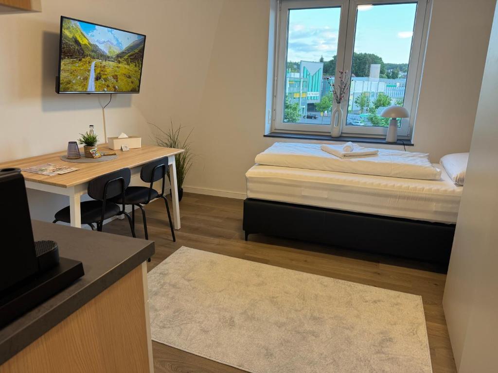 Postel nebo postele na pokoji v ubytování Urbanes Apartment Bielefeld-Bethel