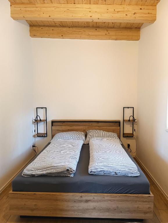 Postel nebo postele na pokoji v ubytování Panorama house Brdy