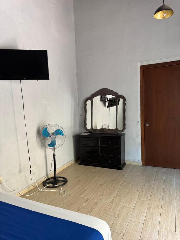 Postel nebo postele na pokoji v ubytování Hotel Queretaro