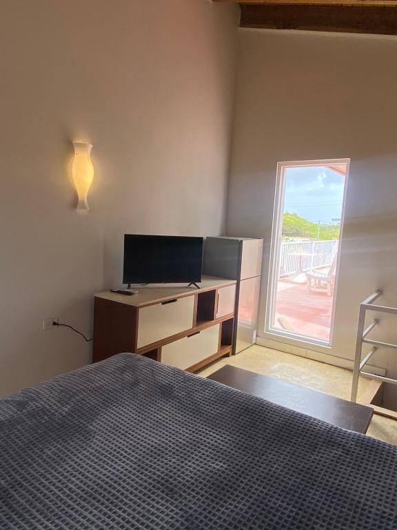 Postel nebo postele na pokoji v ubytování Arco Iris Casa de Campo