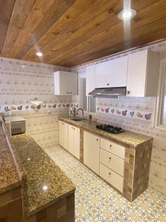 Kuchyň nebo kuchyňský kout v ubytování Arco Iris Casa de Campo