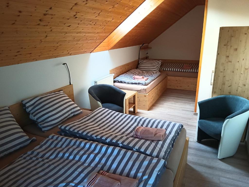 Postel nebo postele na pokoji v ubytování Chalupa Rébus