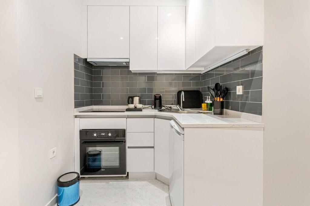 Kuchyň nebo kuchyňský kout v ubytování Chido Residence