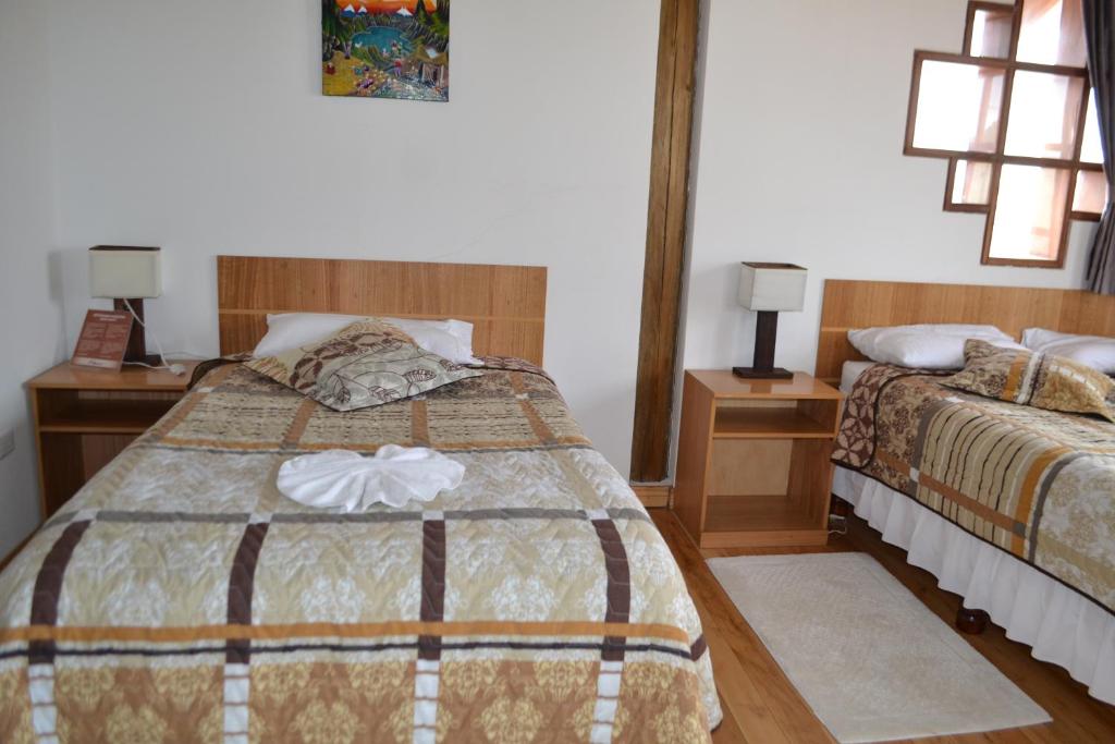 Postel nebo postele na pokoji v ubytování Hotel PrincesaToa