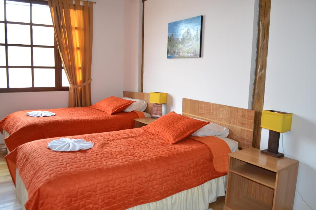 Postel nebo postele na pokoji v ubytování Hotel PrincesaToa