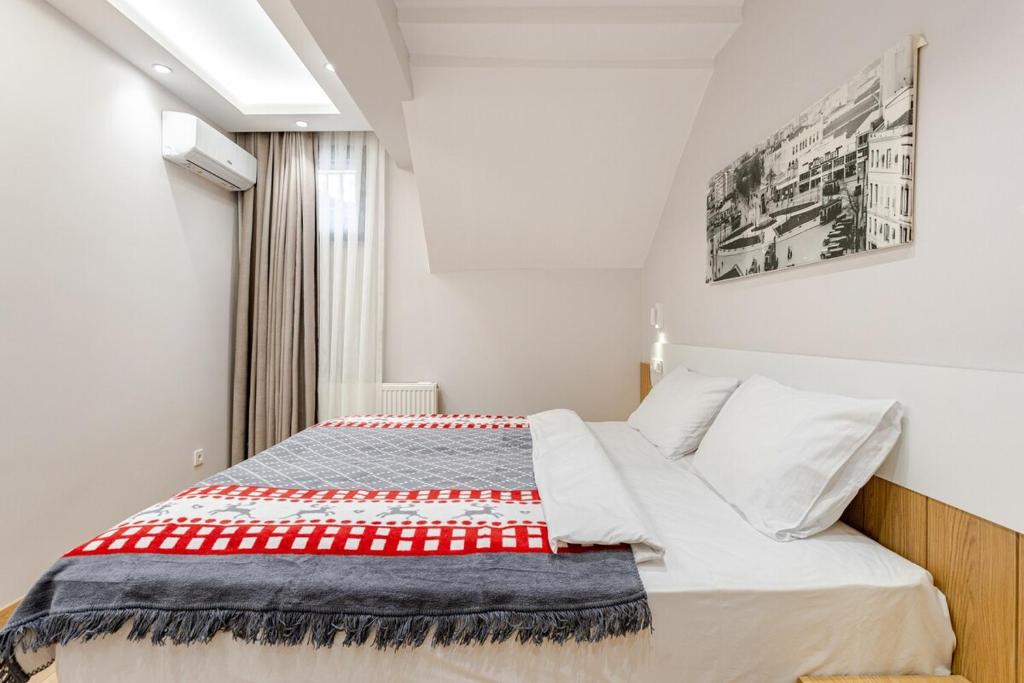 Postel nebo postele na pokoji v ubytování Chido Residence