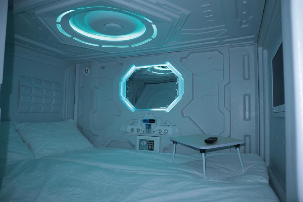 Postel nebo postele na pokoji v ubytování Blue Viking Pods