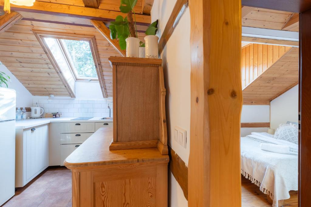 Łóżko lub łóżka w pokoju w obiekcie Apartamenty Batur