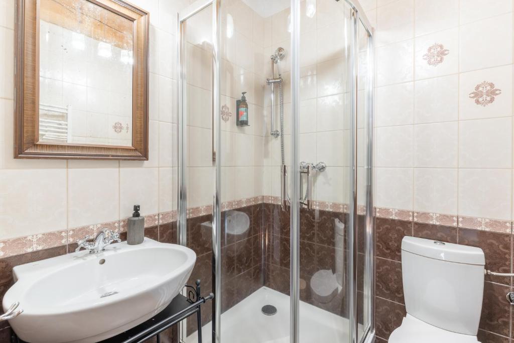 Łazienka w obiekcie Apartamenty Batur