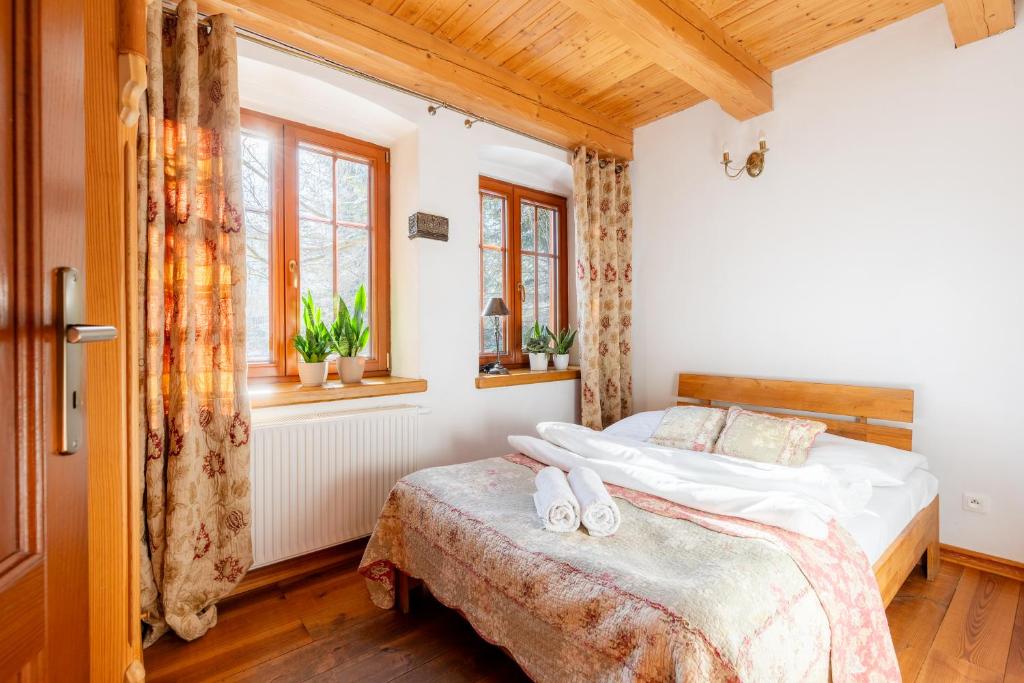 Łóżko lub łóżka w pokoju w obiekcie Apartamenty Batur