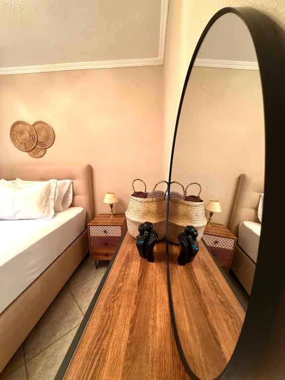 Postel nebo postele na pokoji v ubytování THEOHARIS SUMMERHOUSE