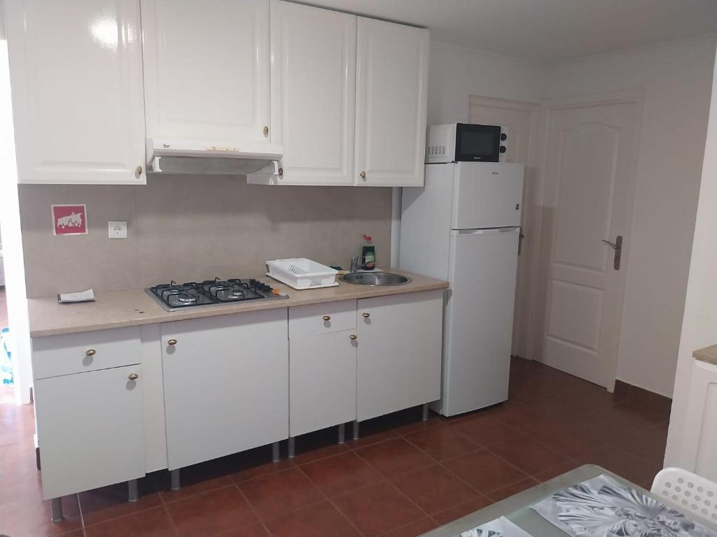 Dapur atau dapur kecil di Casa Santa Maria apartamento B