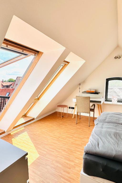 Postel nebo postele na pokoji v ubytování Das Stader Penthouse mit Dachterrassen