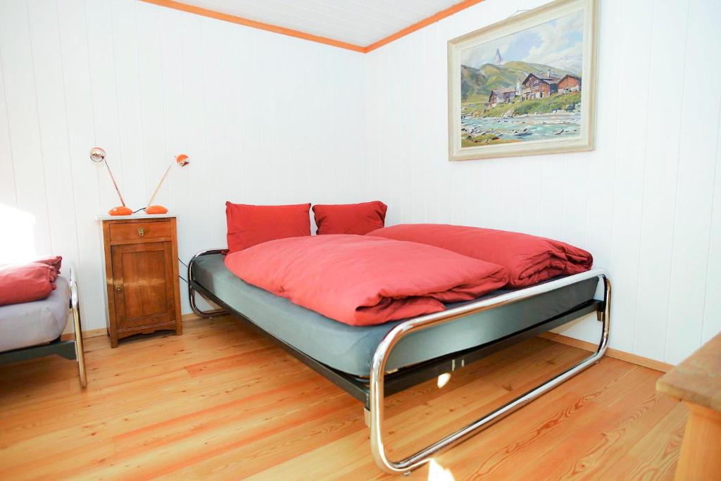 Postel nebo postele na pokoji v ubytování Grosshus Vals