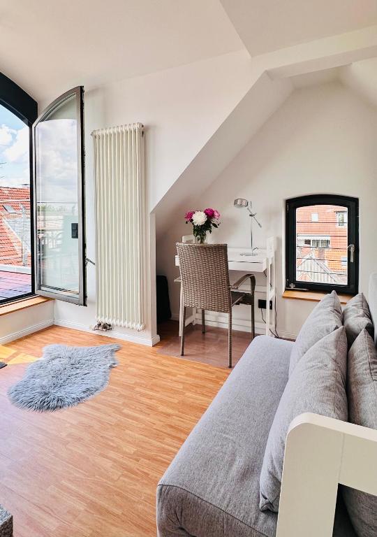 Posezení v ubytování Das Stader Penthouse mit Dachterrassen