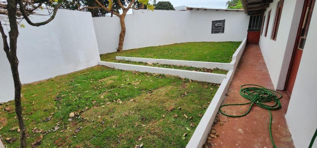 Zahrada ubytování Casa aconchegante - compartilhada