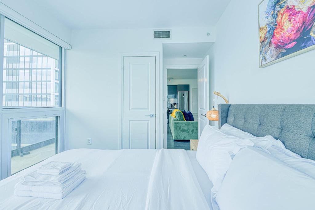 Letto o letti in una camera di RivetStays - The Jarvis