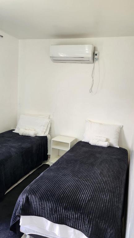Postel nebo postele na pokoji v ubytování Apartamento PRATICO