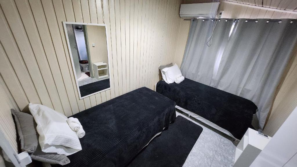 Postel nebo postele na pokoji v ubytování Apartamento PRATICO