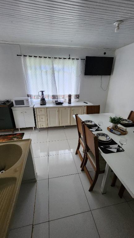 Kuchyň nebo kuchyňský kout v ubytování Apartamento PRATICO