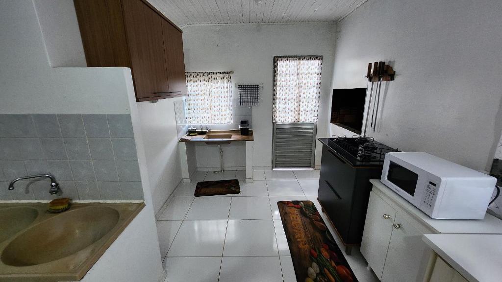 Kuchyň nebo kuchyňský kout v ubytování Apartamento PRATICO