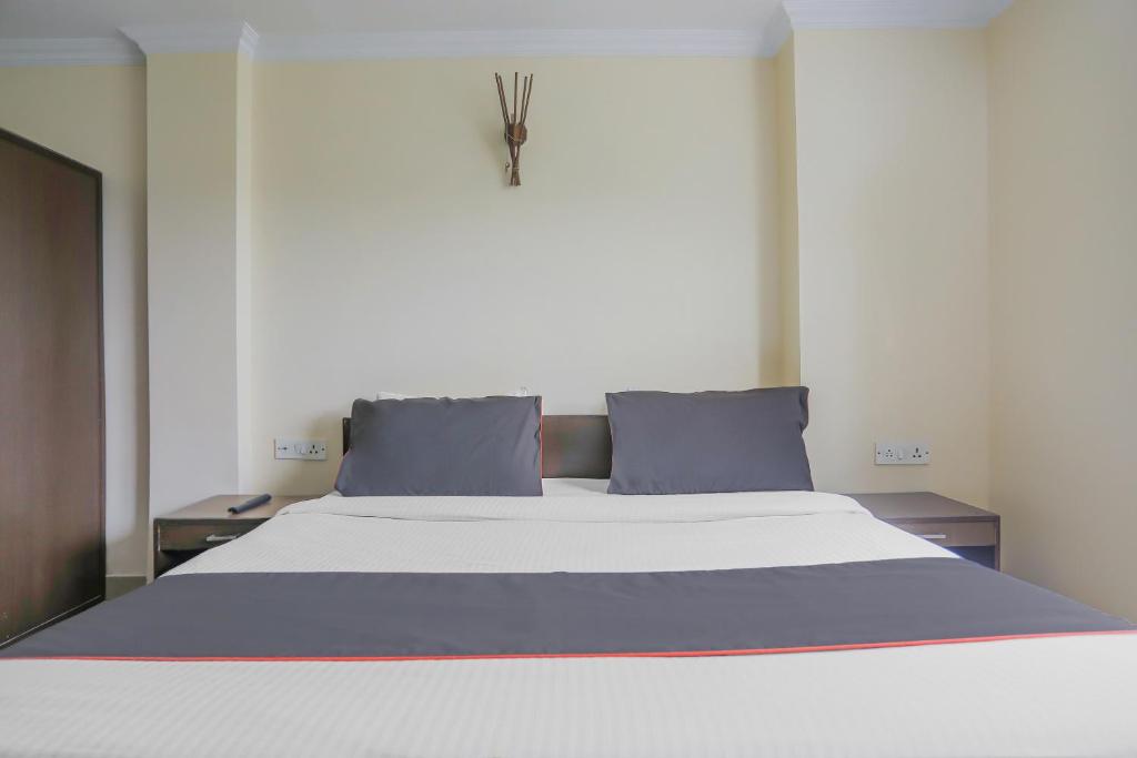 Postel nebo postele na pokoji v ubytování Townhouse Green Park Residency 1