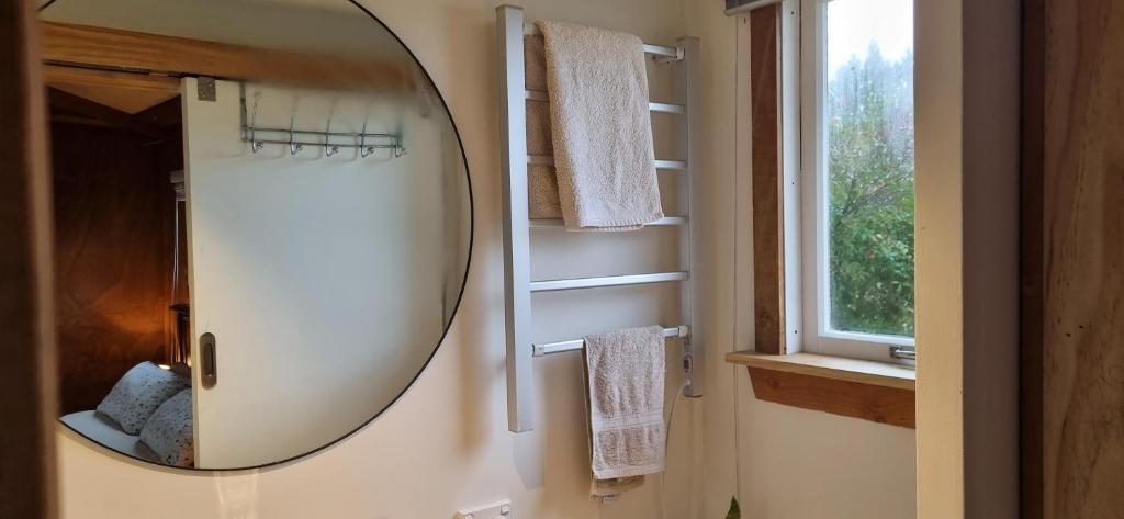 Ein Badezimmer in der Unterkunft Rameka Chalet
