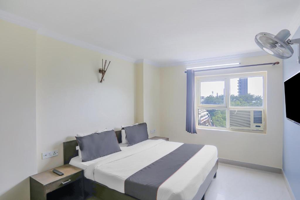 Postel nebo postele na pokoji v ubytování Townhouse Green Park Residency 1