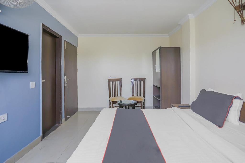 Postel nebo postele na pokoji v ubytování Townhouse Green Park Residency 1