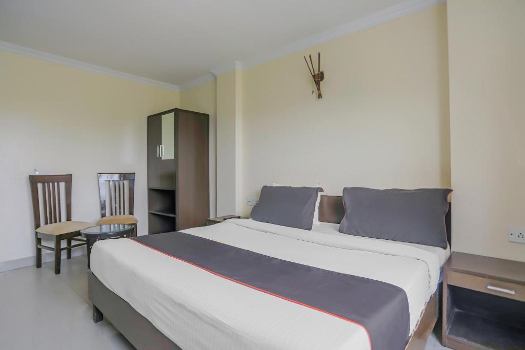 Postel nebo postele na pokoji v ubytování Townhouse Green Park Residency 1