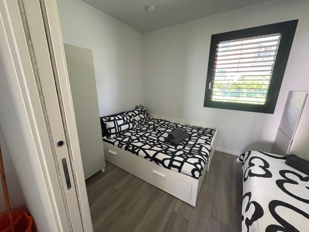 Postel nebo postele na pokoji v ubytování Casa Darcellas trilocale in a4 con giardino