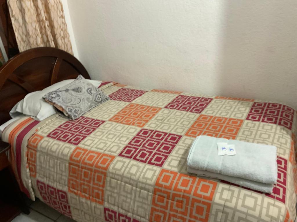 Postel nebo postele na pokoji v ubytování Hostal Almagro
