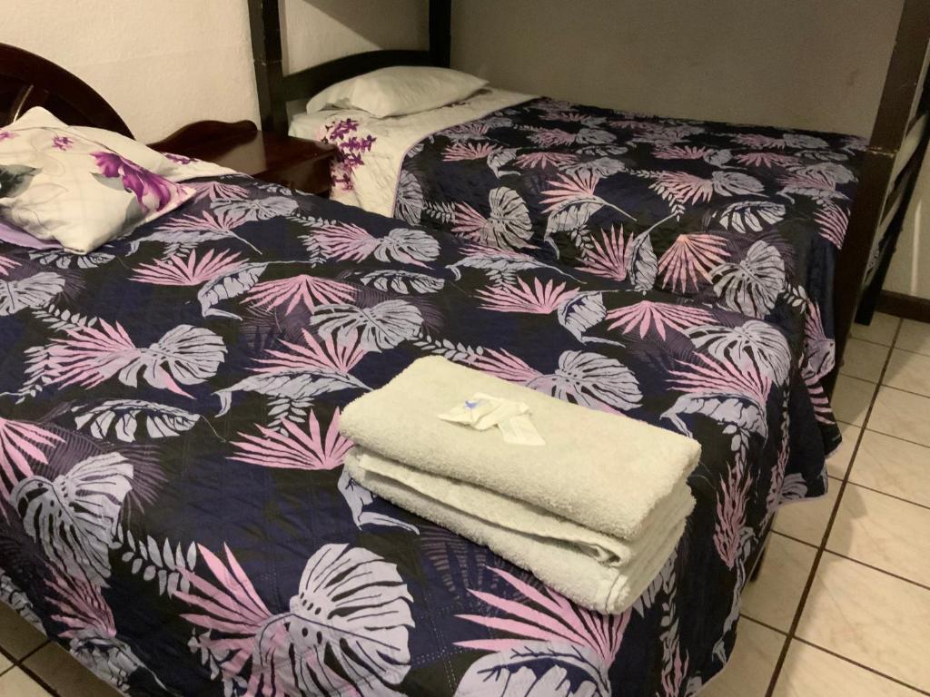 Postel nebo postele na pokoji v ubytování Hostal Almagro