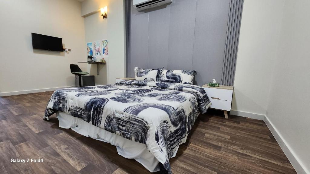 Postel nebo postele na pokoji v ubytování Venice ضباب