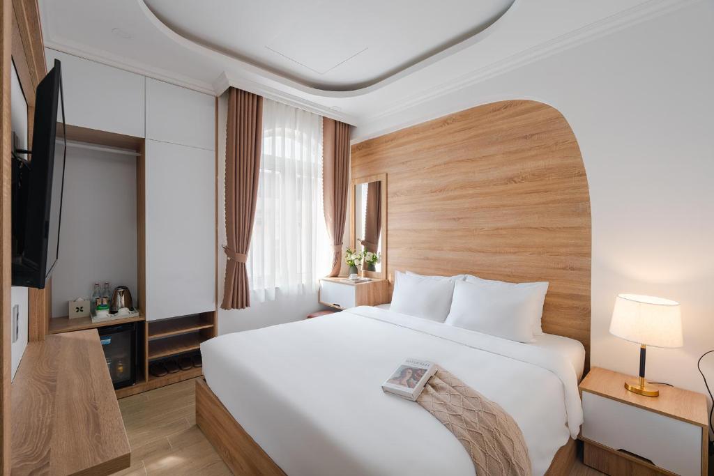 Voodi või voodid majutusasutuse Nature Hotel Da Lat - Le Dai Hanh toas