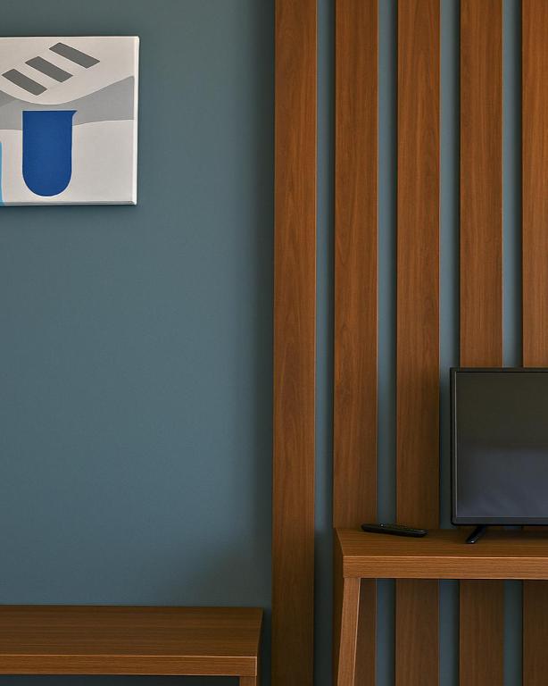 TV a/nebo společenská místnost v ubytování AMMEN Rooms