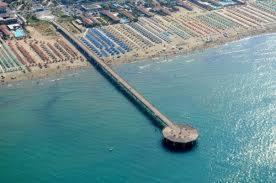 an aerial view of a large body of water at Il Pontile Holidays Apartment in Marina di Pietrasanta