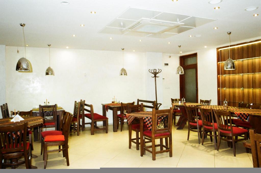 Restaurace v ubytování Cesar Guest Rooms