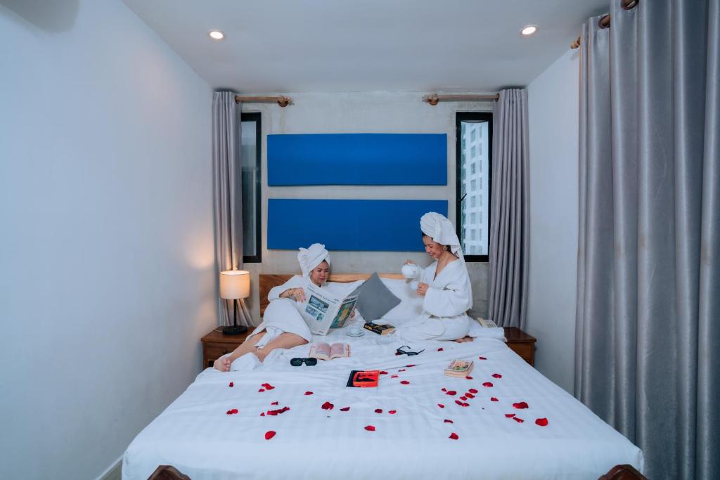 Postel nebo postele na pokoji v ubytování Home Chic Hotel