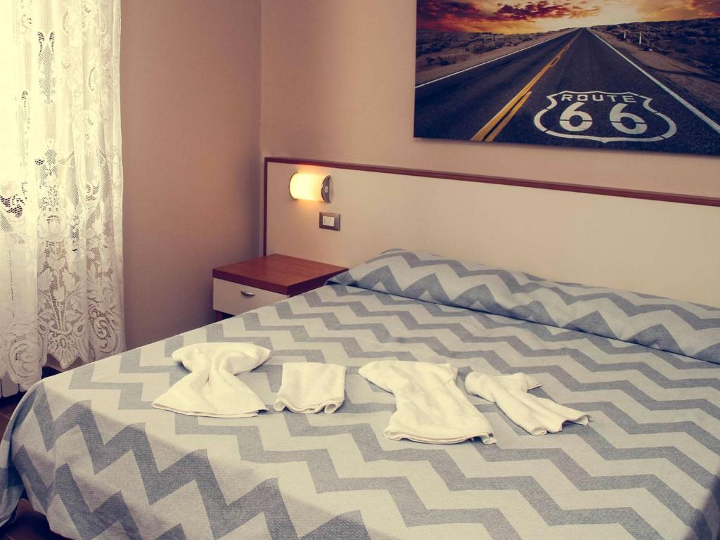 Postel nebo postele na pokoji v ubytování B&B Tina