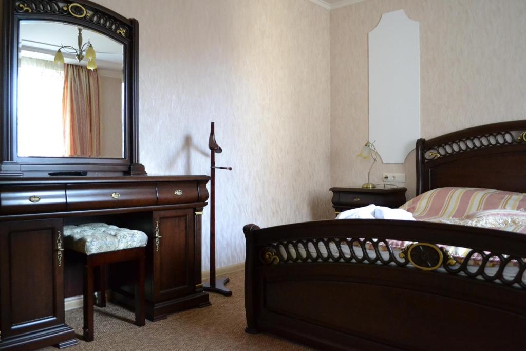 Postel nebo postele na pokoji v ubytování Lileya Hotel